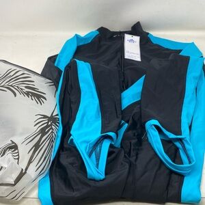 Women’s size medium black and blue new with tags swim suit long sleeve pants